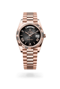 Rolex Oyster Perpetual Day-Date 40 in 18 ct Everose gold with a fluted bezel