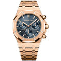 Audemars Piguet Royal Oak Chronograph 41mm watch in yellow gold with a blue dial.